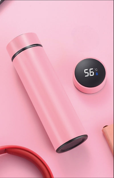 Thermos intelligent OCHO en rose pastel, élégant et fonctionnel avec écran LED pour afficher la température en temps réel. Idéal pour une hydratation stylée tout au long de la journée.